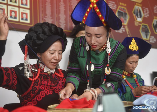 Liangshan in Sichuan Takes Various Measures to Help Women Sh